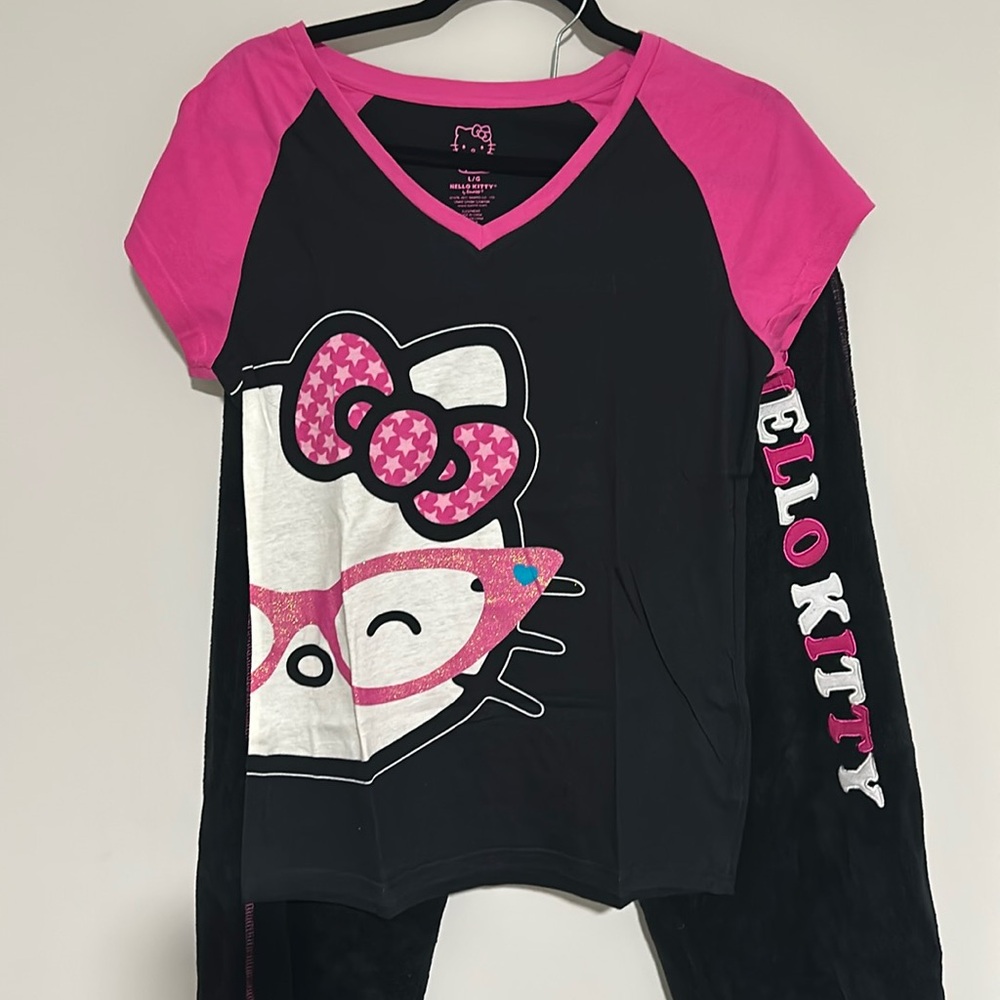 Hello kitt   pajamasa brand new color black size largee